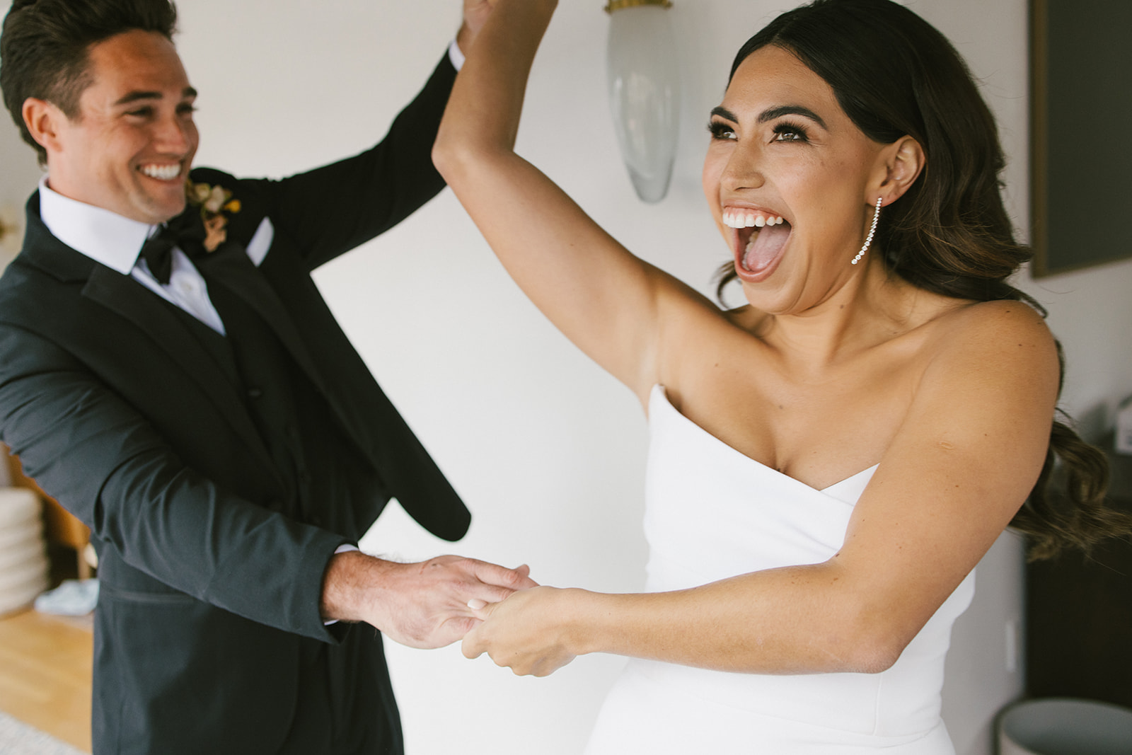 groom spinning happy bride at San Clemente Wedding Venue