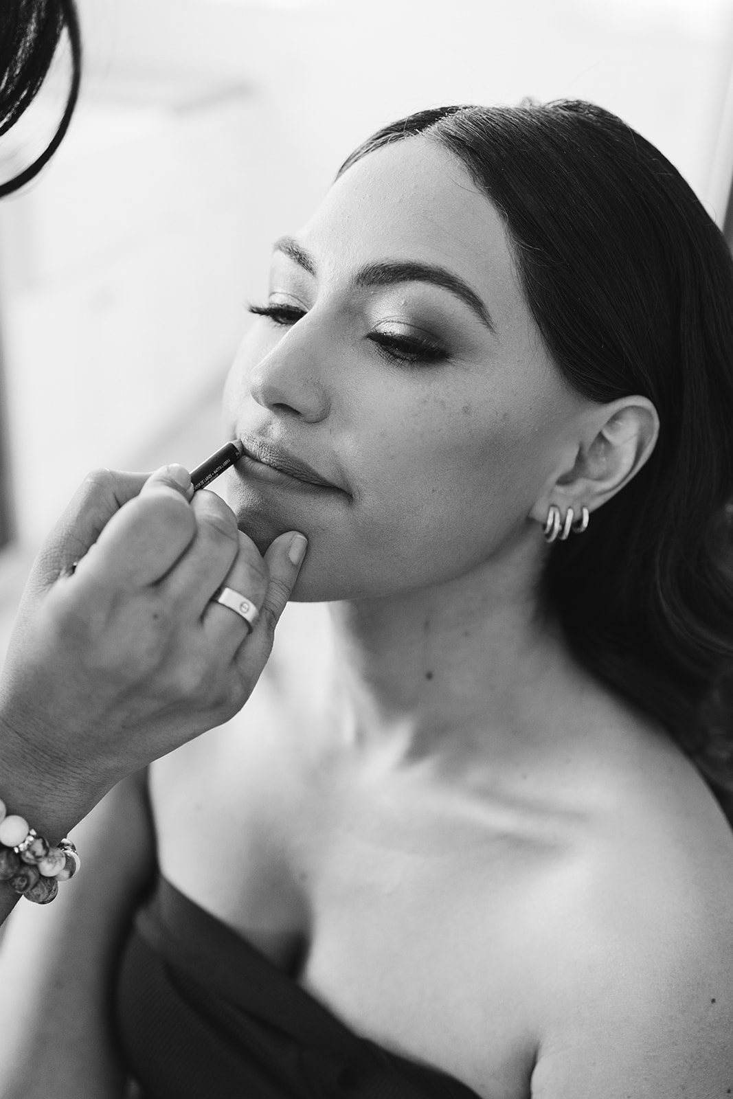 up close of bride getting makeup done at San Clemente Wedding Venue