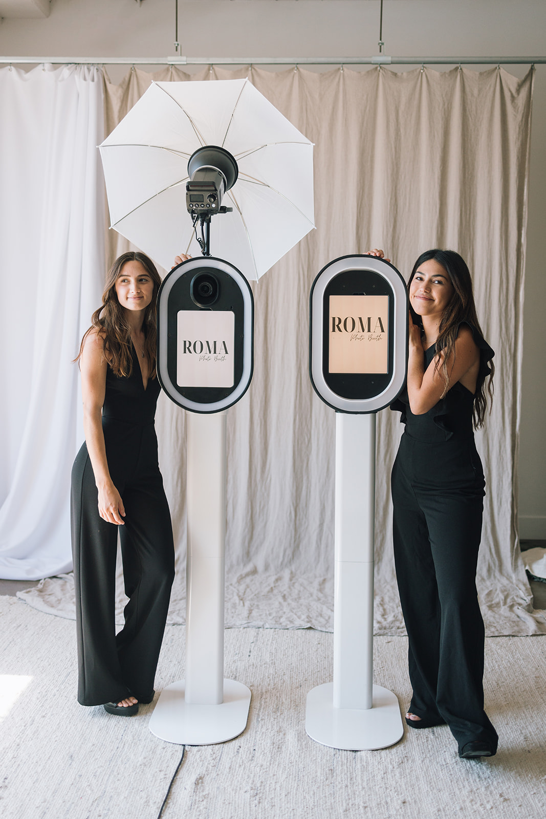 two female business owners with their products in studio