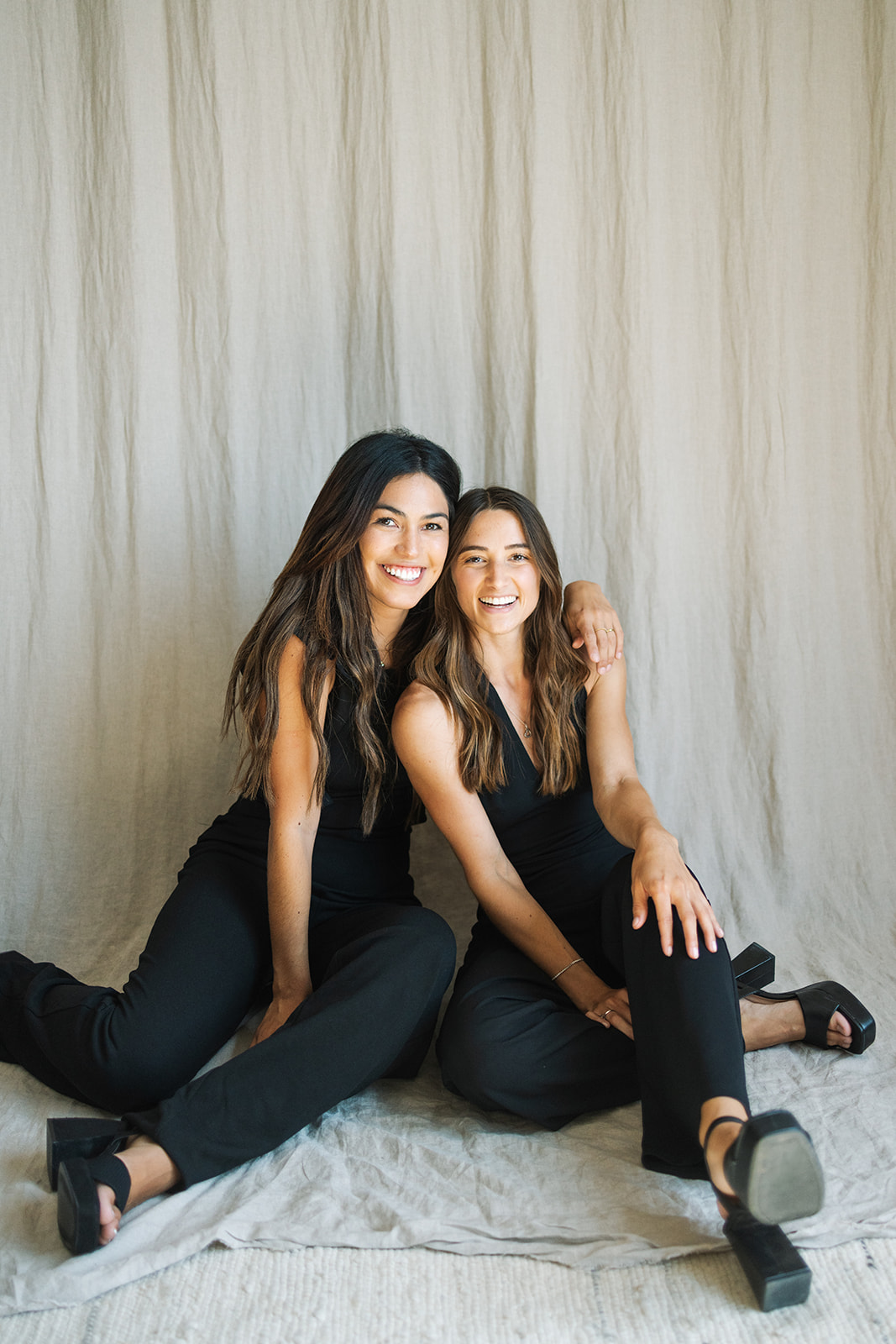 two business owners sitting and posing during a Small Business Branding Photography shoot 