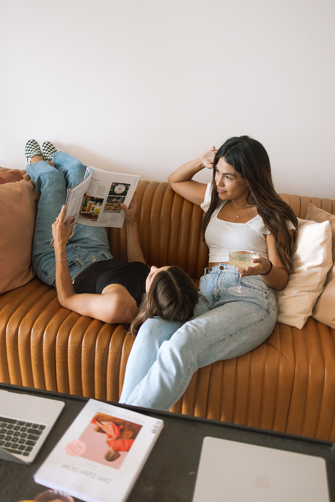 two girls on a couch during their branding session 