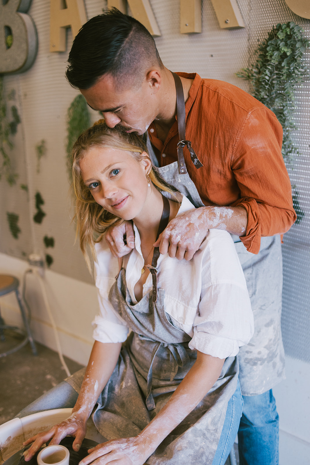 a couple making art during a date night photoshoot 