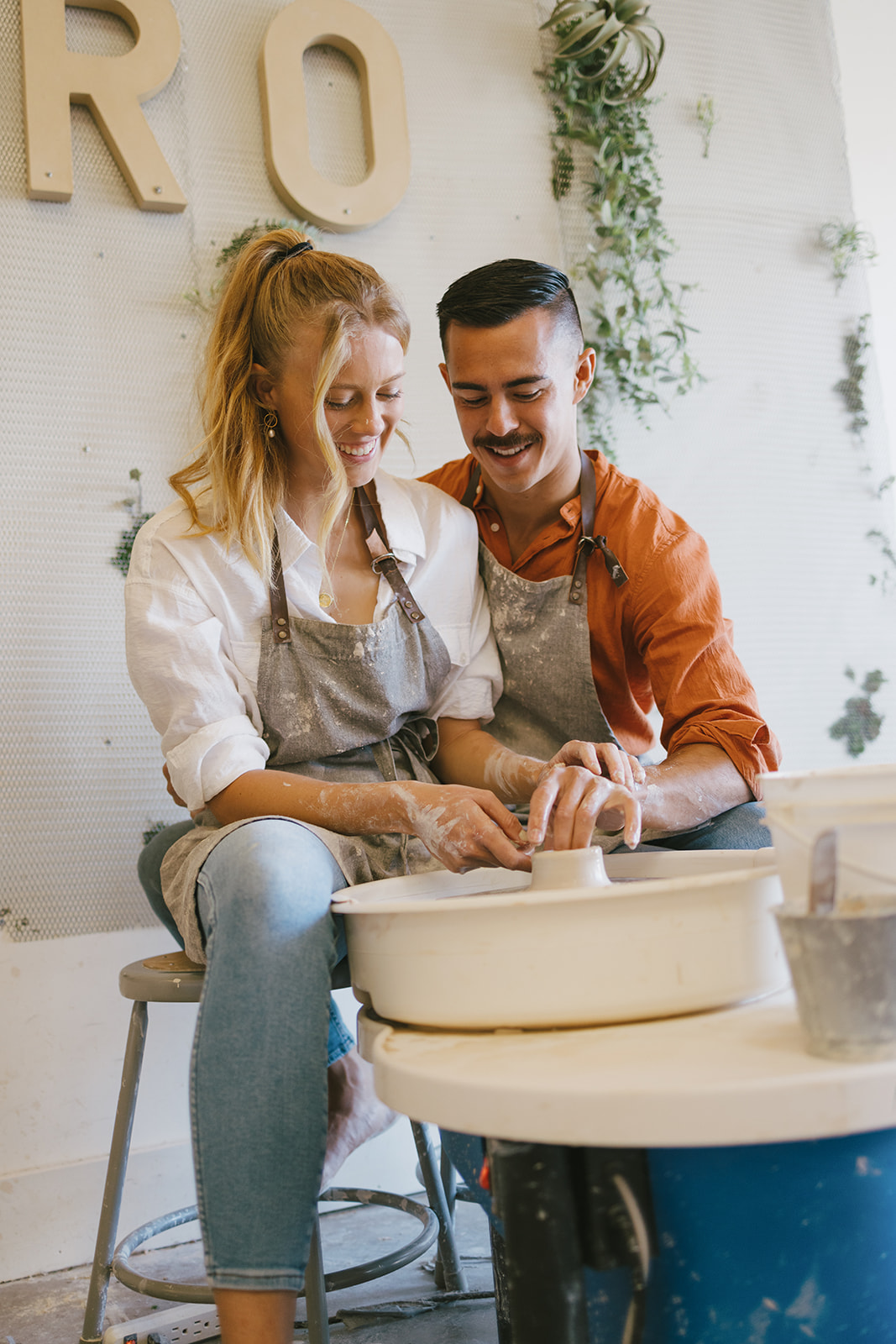 a couple making pottery together in California 