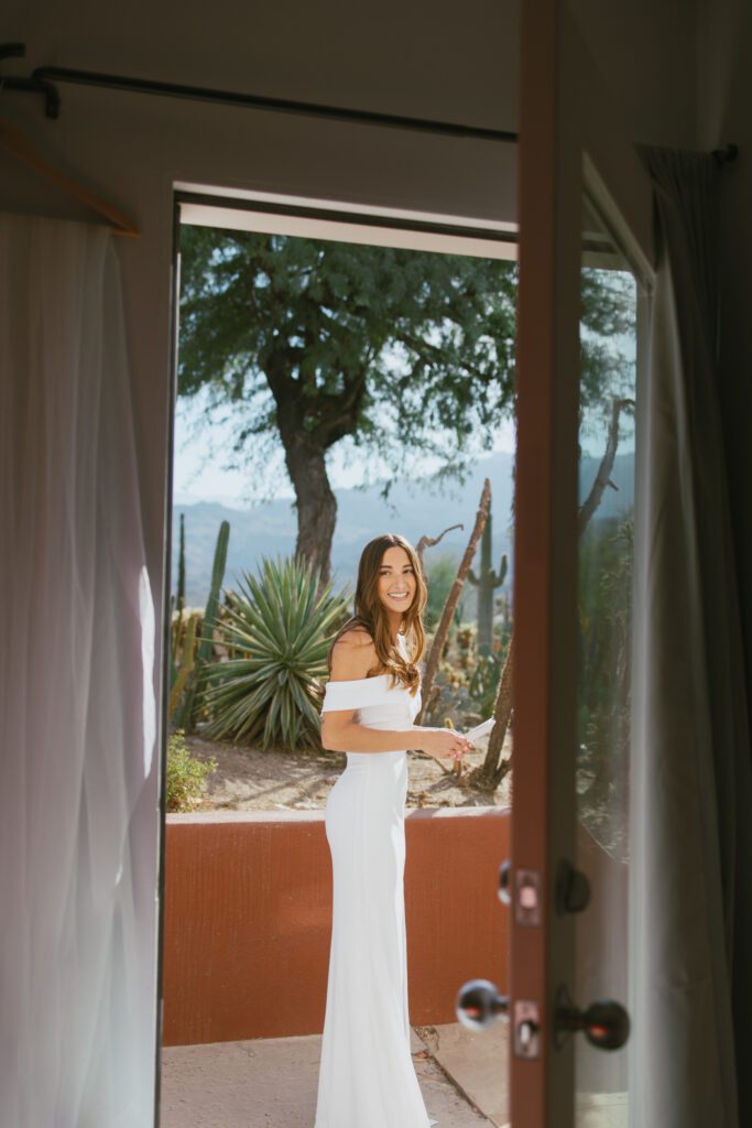 bride through the door before the first look