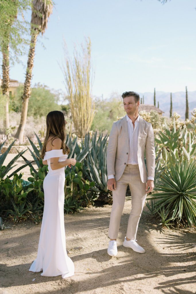 bride and groom first look for Palm Springs wedding 