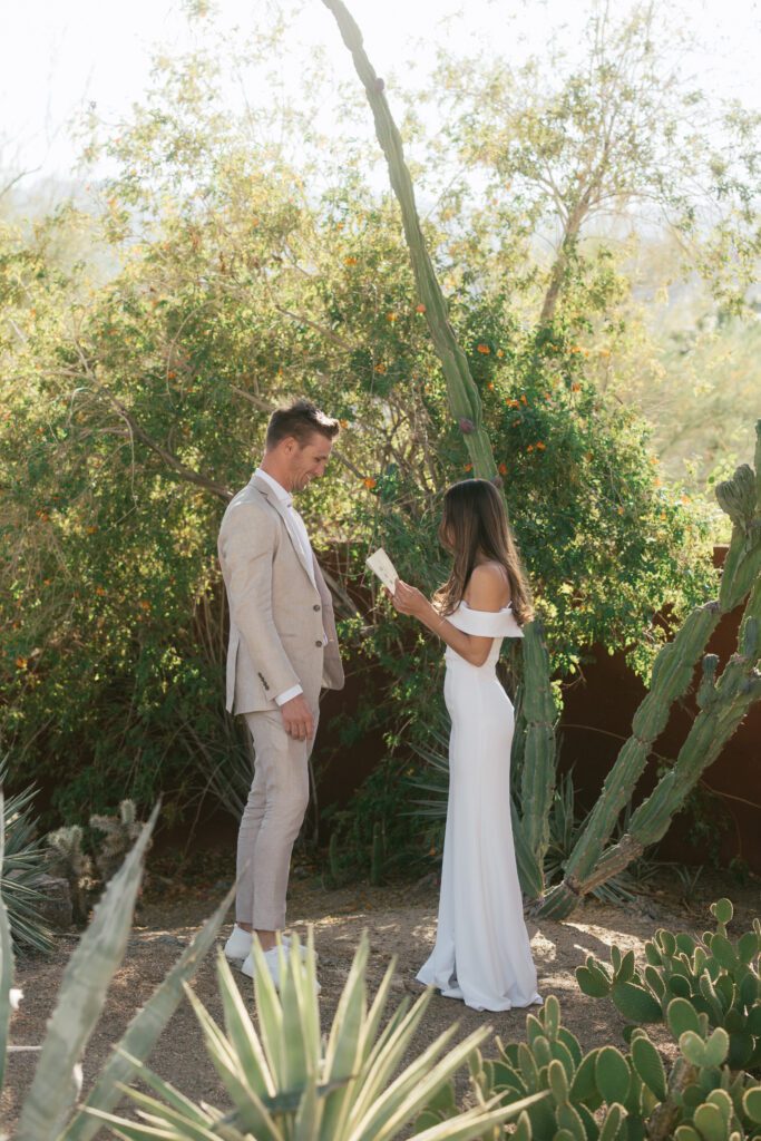 Palm Springs wedding bride and groom as they read their private vows 