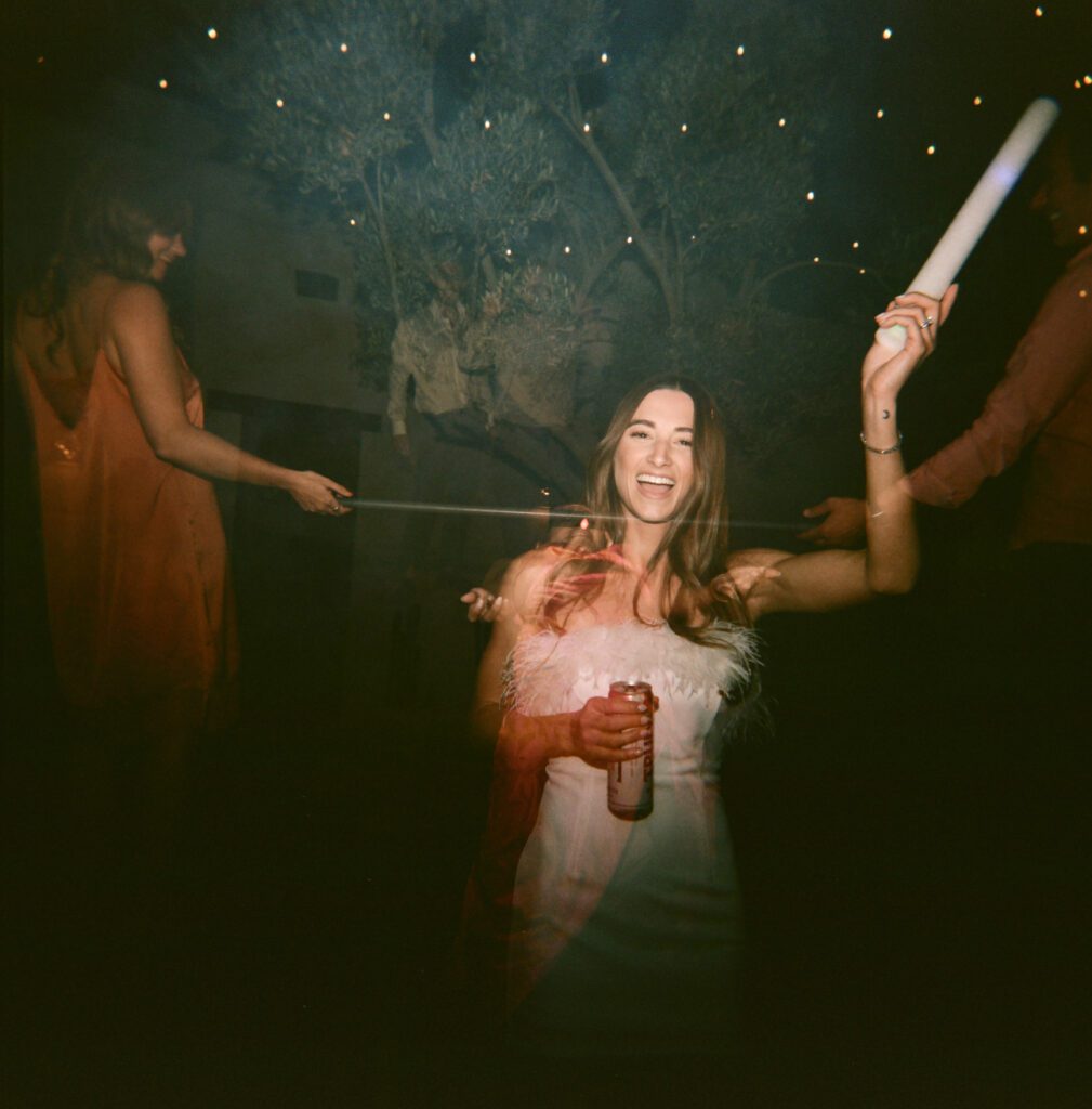 film photo of bride dancing at the Palm Springs wedding reception