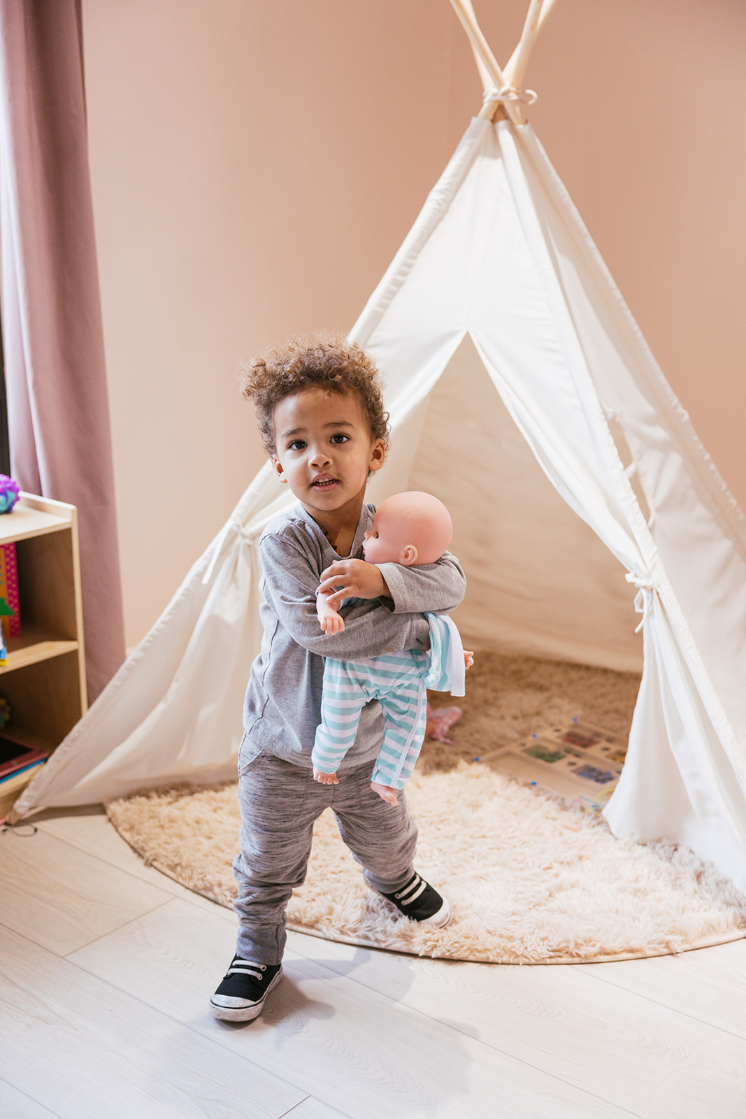 a child playing in the office during a lifestyle branding photography session