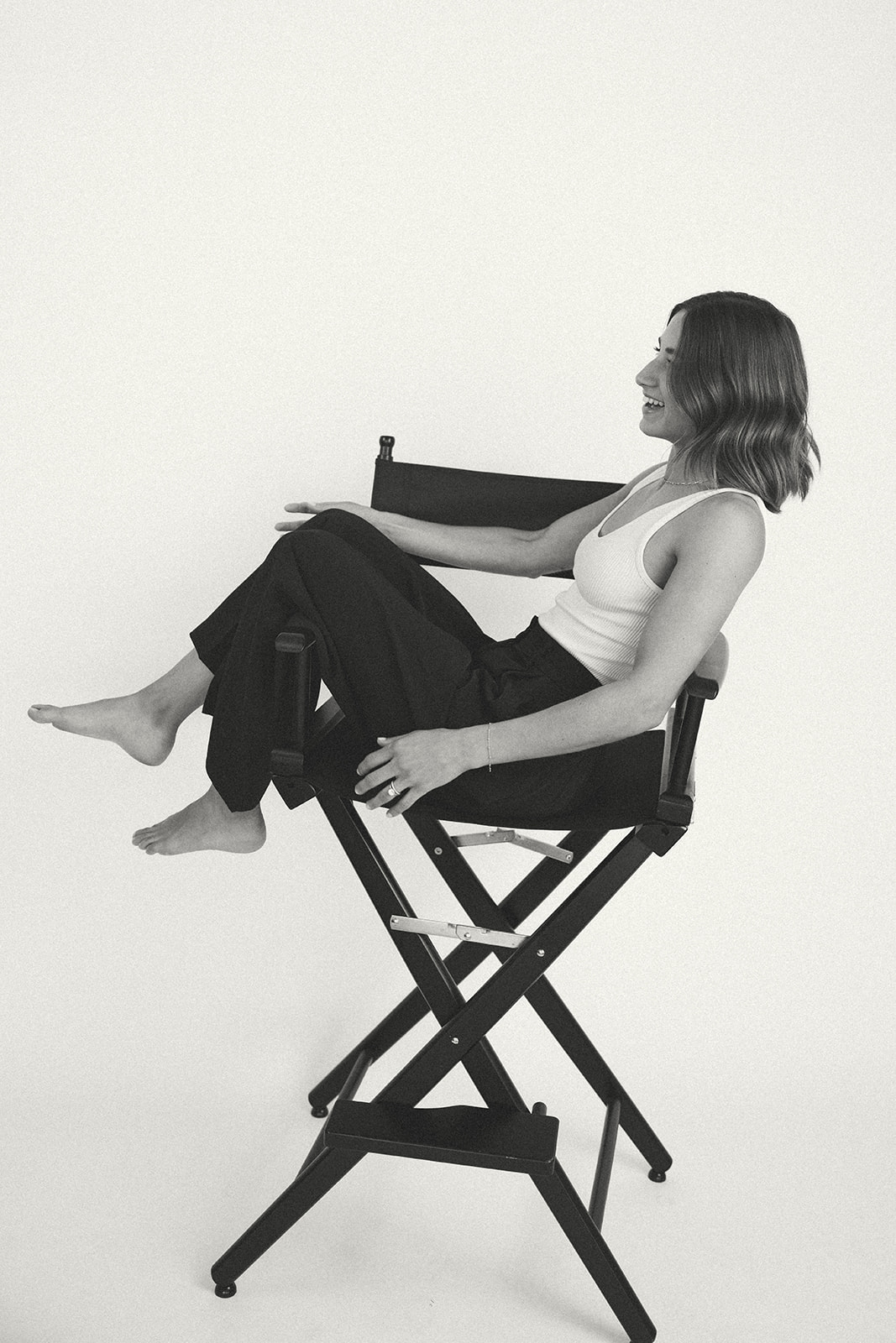 a woman sitting in a chair during her branding photography session in California