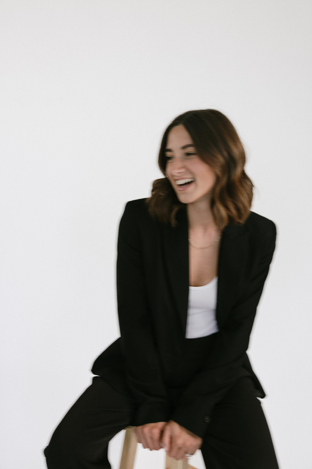 blurry image of a female business owner during her branding photography session