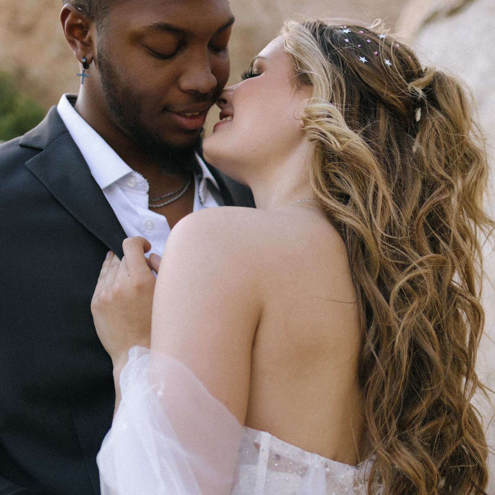 bride and groom about to kiss in an intimate portrait 