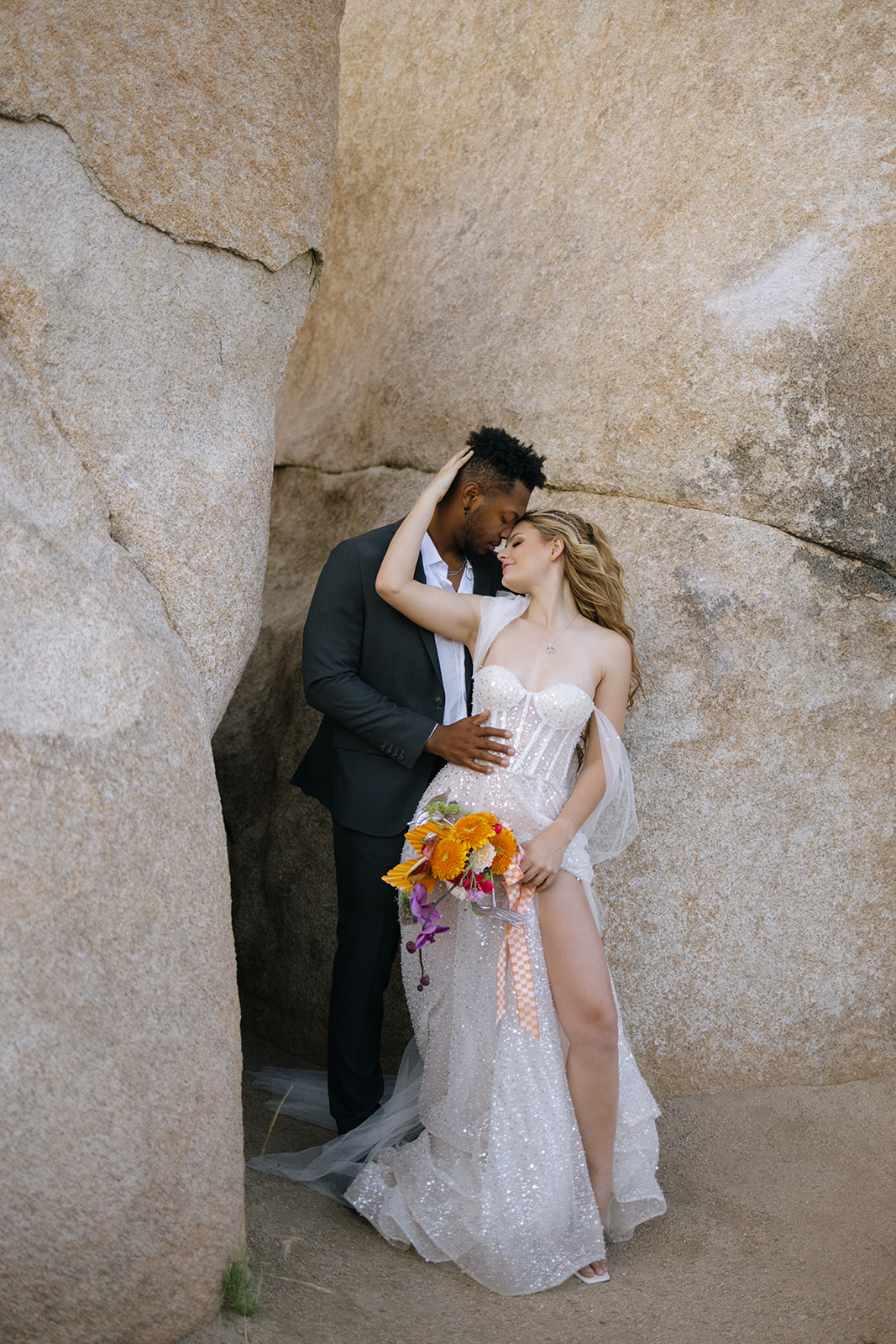 elopement portrait against the rocks in Joshua Tree