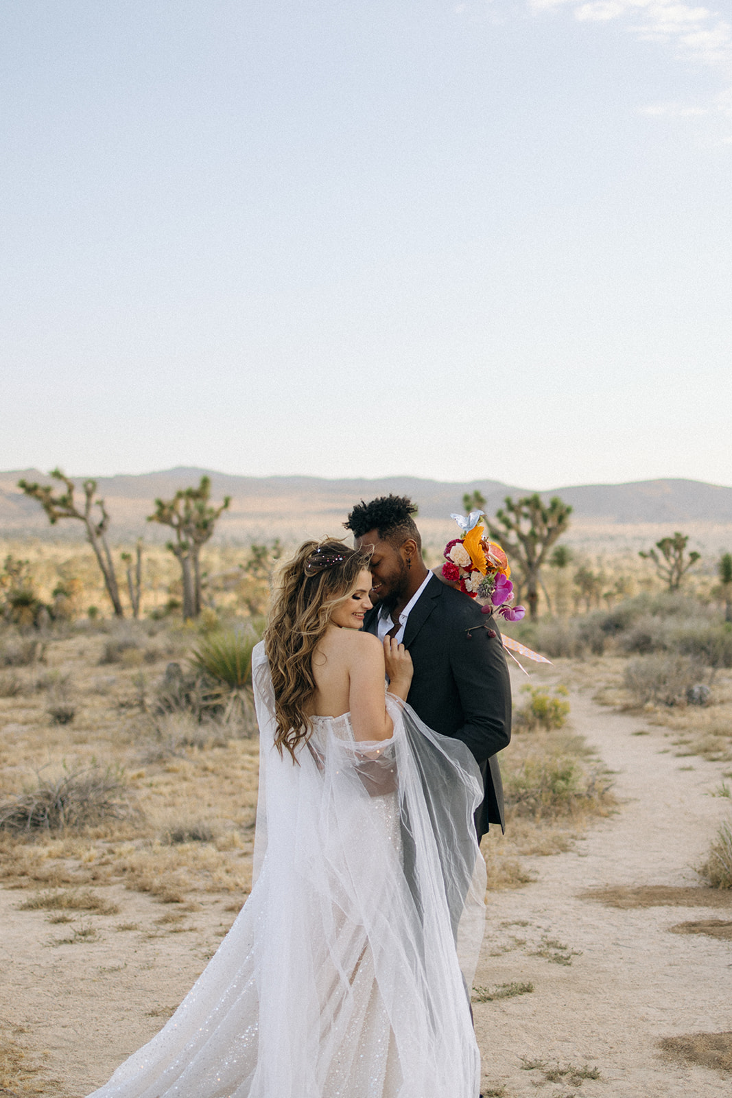 bride and groom portrait in Joshua Tree National Park during a southern California elopement