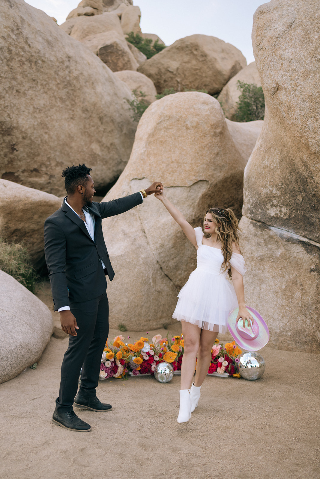 the bride changes into a shorter dress for more southern California elopement photos 