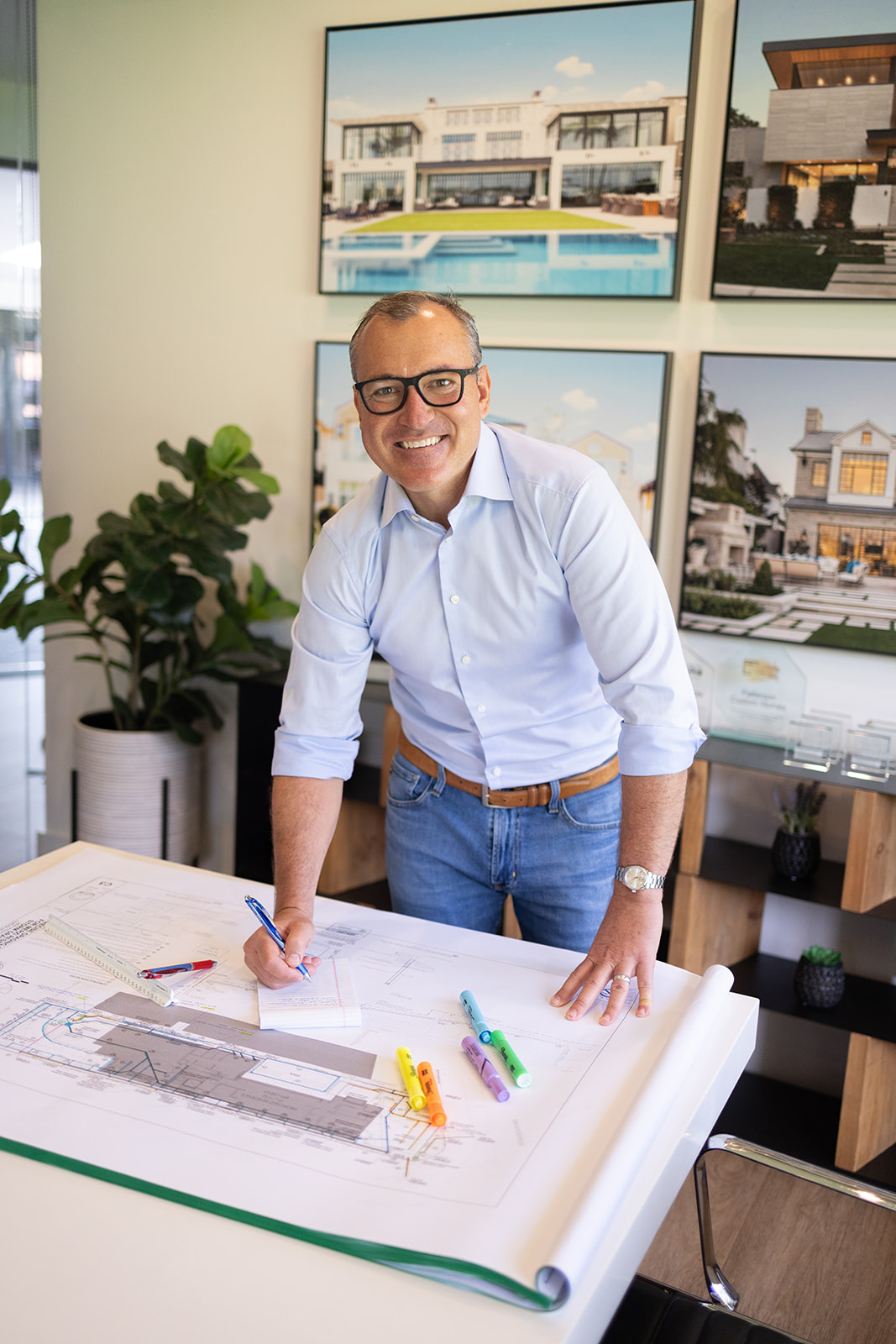 a business owner smiling for a portrait 