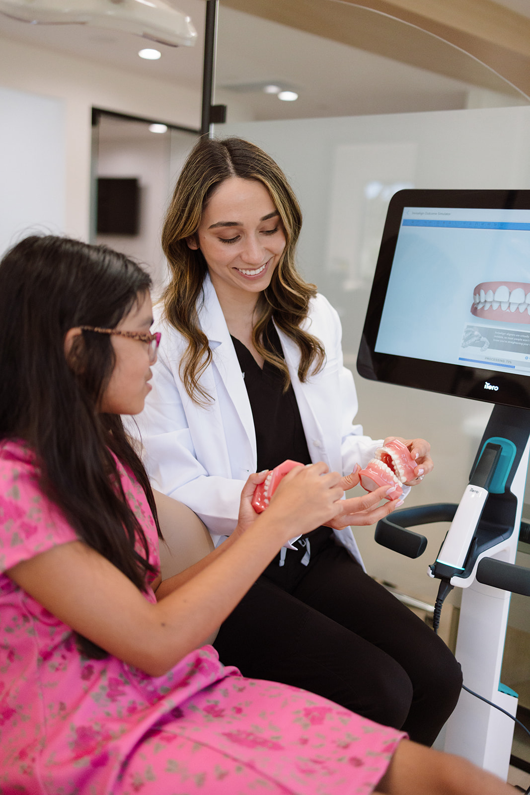 the orthodontist with a client