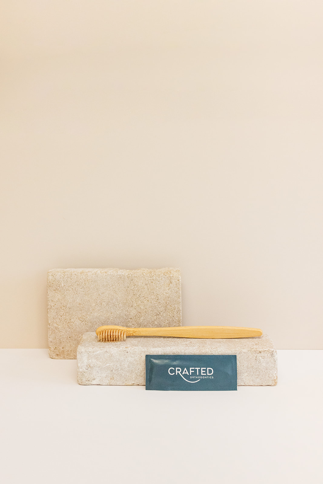 modern branding photos of a toothbrush and business card 