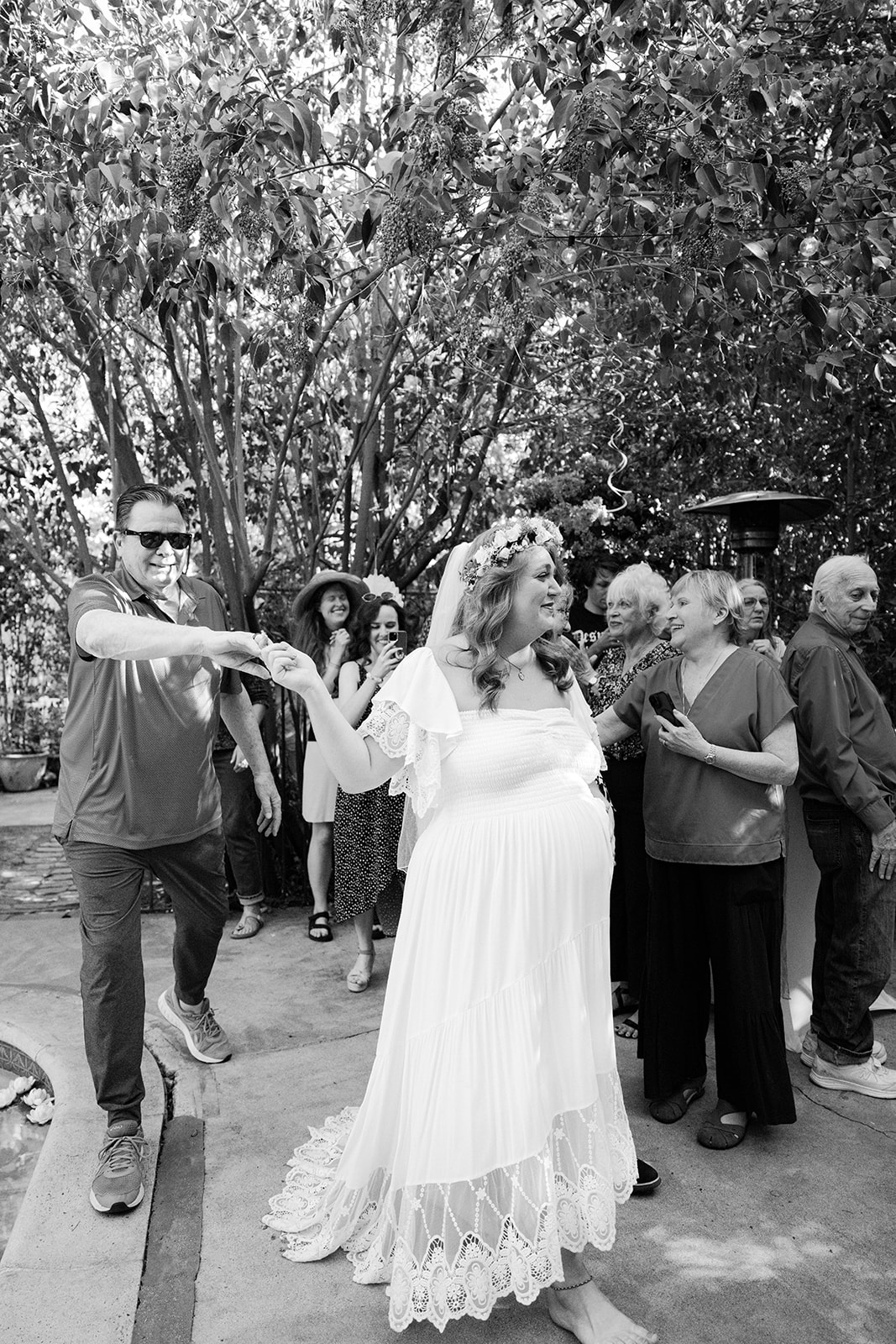 the bride walking down the path to get to the altar