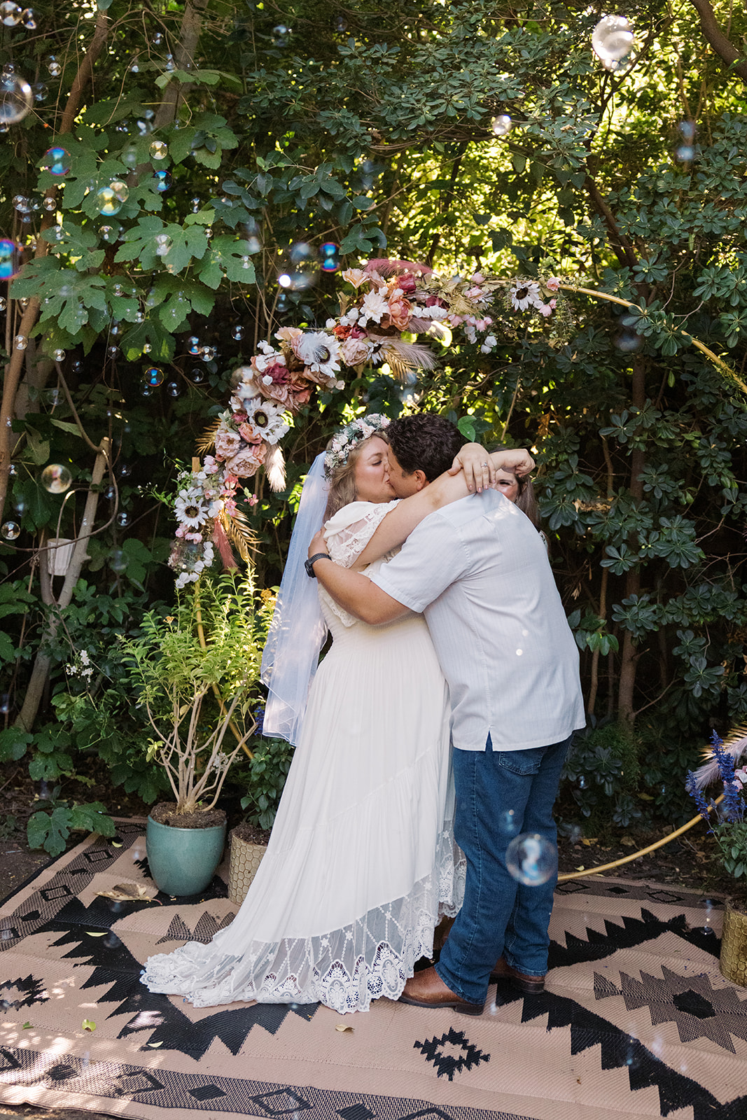 the bride and groom kissing at the Small Intimate Wedding ceremony 