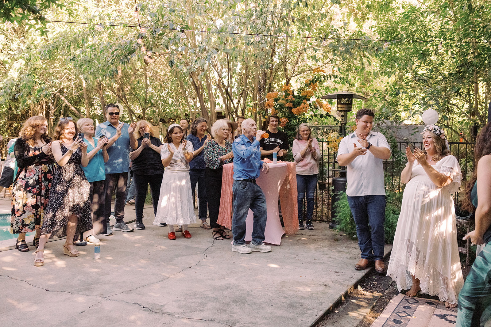 everybody clapping to toasts being said 