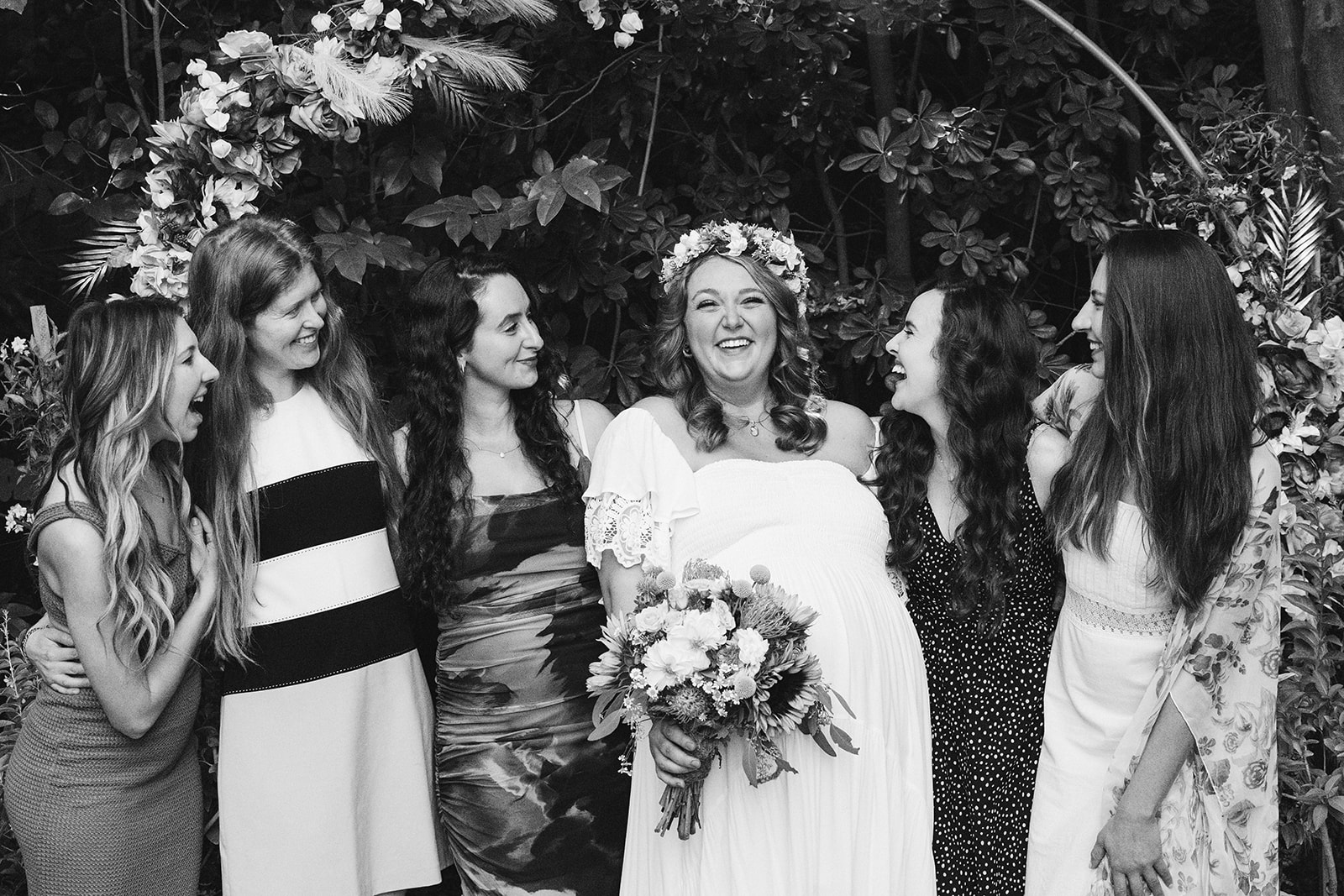 the bride laughing with her friends 