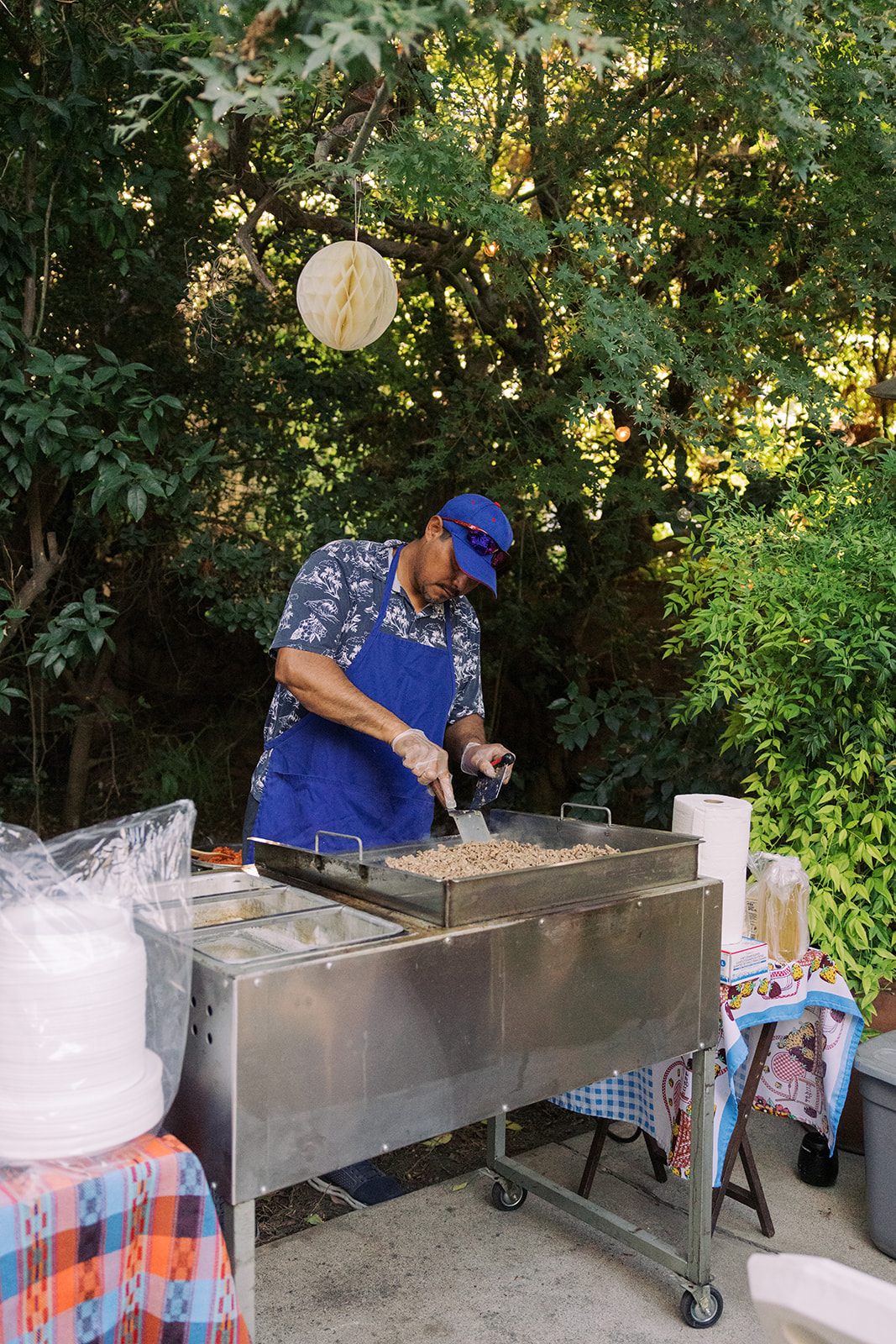 a vendor cooking up some food after the Small Intimate Wedding ceremony 