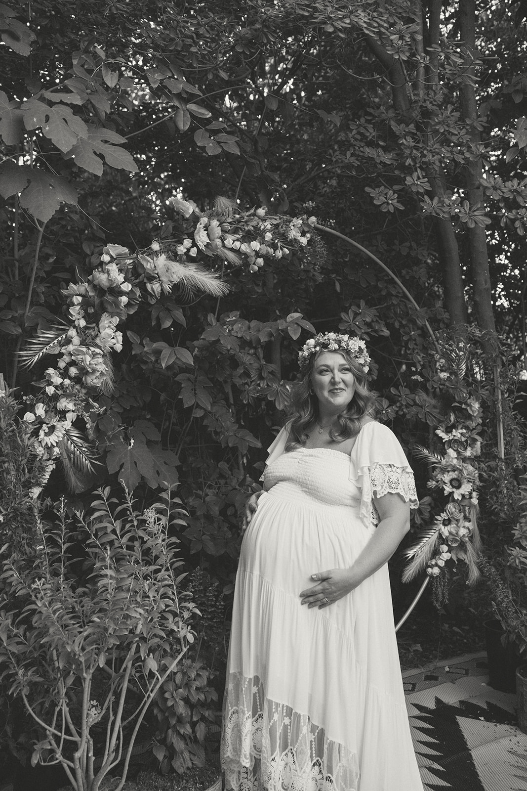 the bride holding her pregnant belly at their Small Intimate Wedding